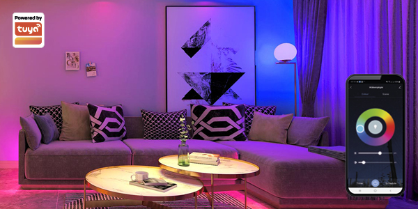 Living room with colourful lighting. Smartphone showing Tuya app. Tuya logo